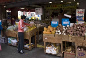 307-6984 Chinatown: Woman Selecting Fruit