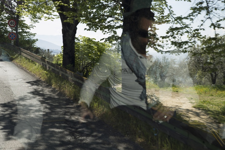 407-9602 IT - Pier Luigi reflected on the road to Assisi.jpg