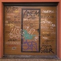 408-7533 IT - Bologna - Doorway Graffiti