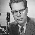 409-3323 BRG Bill Reid at the CBC microphone circa 1952.jpg