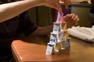 308-6585 Thomas builds a tower with sweetener packets