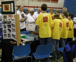 The judges meet with the team.