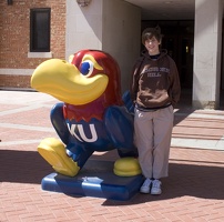 308-0849 Thomas with the Jayhawk in front of the Student Union