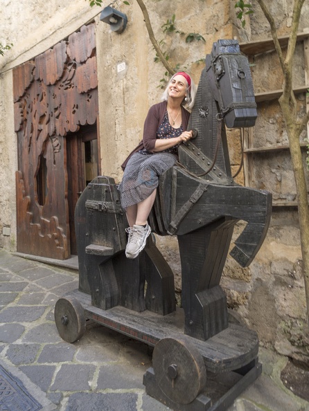 407-8866 IT - Orvieto - Woman on Michelangeli Wooden Horse.jpg